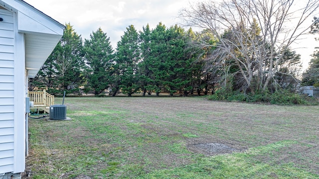 view of yard featuring central AC unit