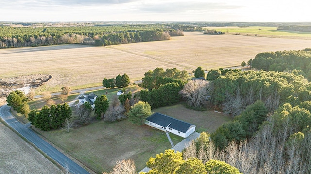 birds eye view of property featuring a rural view