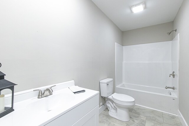 full bathroom with bathtub / shower combination, vanity, and toilet