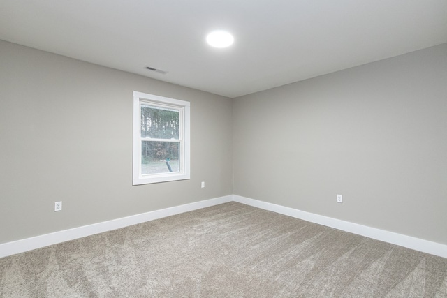 unfurnished room with carpet