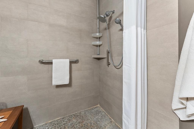 bathroom featuring a stall shower