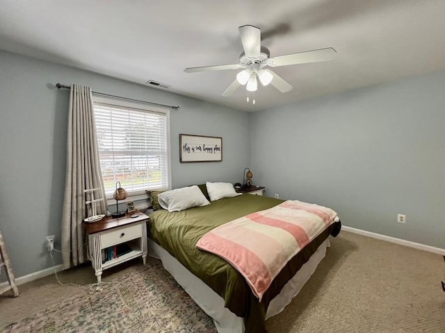 carpeted bedroom featuring ceiling fan