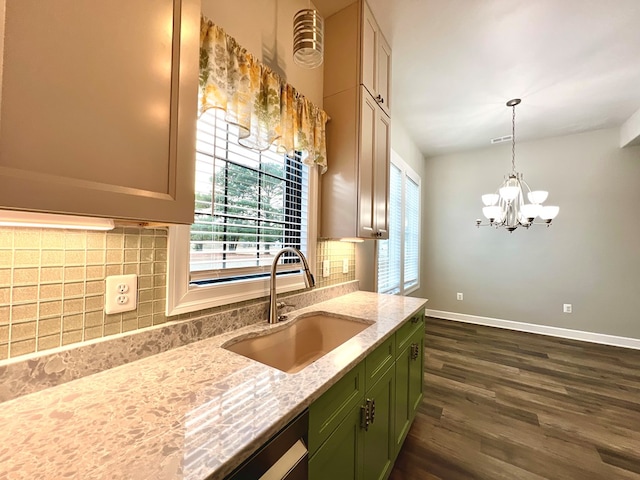 3102 Cutter Ct, Greenbackville, VA 23356 - kitchen featuring green cabinetry, tasteful backsplash, dark wood-style floors, and light stone countertops