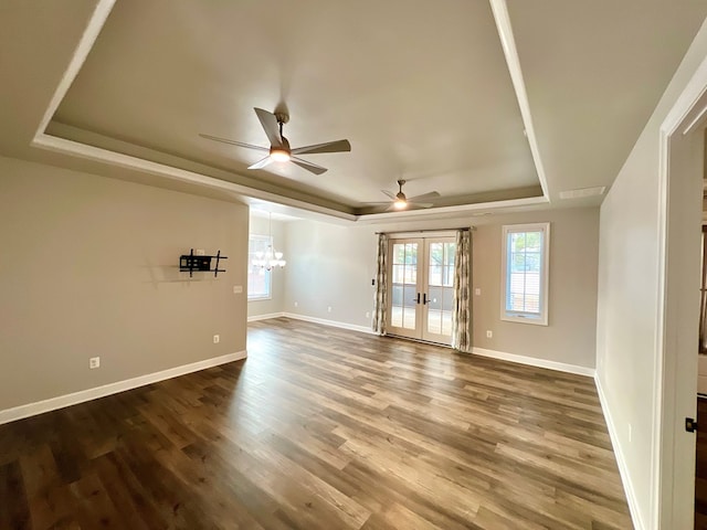 3102 Cutter Ct, Greenbackville, VA 23356 - spare room featuring a tray ceiling, ceiling fan, and plenty of natural light