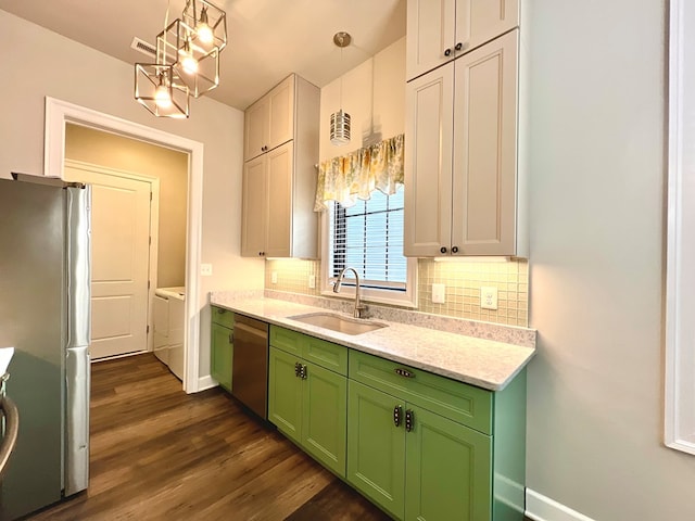 3102 Cutter Ct, Greenbackville, VA 23356 - kitchen featuring dishwasher, green cabinets, freestanding refrigerator, dark wood-style flooring, and decorative backsplash