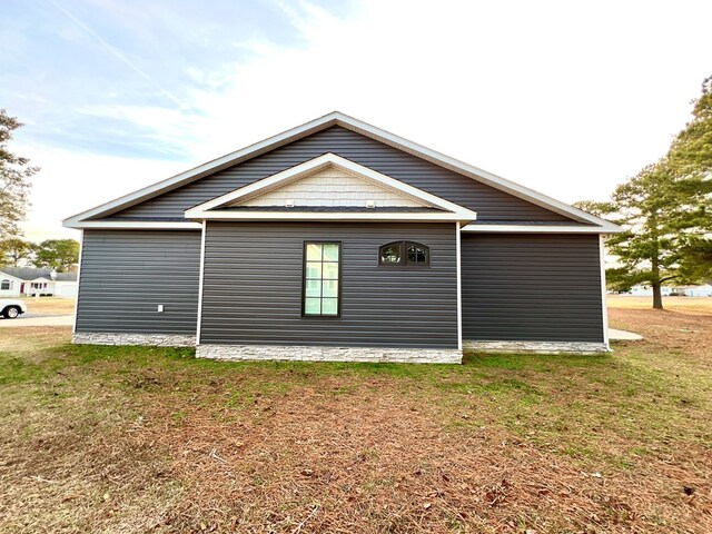 3102 Cutter Ct, Greenbackville, VA 23356 - view of property exterior with a lawn