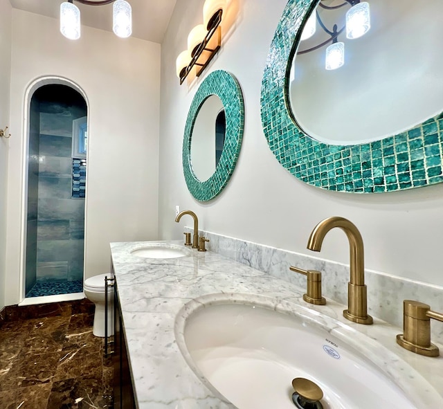 3102 Cutter Ct, Greenbackville, VA 23356 - bathroom featuring double vanity, a tile shower, and marble finish flooring