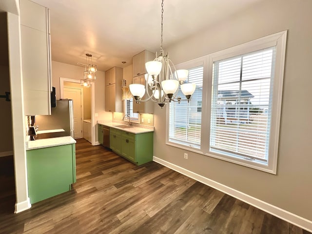 3102 Cutter Ct, Greenbackville, VA 23356 - kitchen with green cabinets, a chandelier, dark wood-type flooring, stainless steel appliances, and light countertops