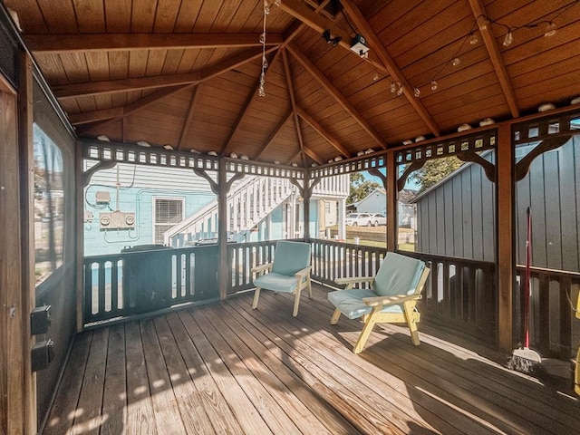 wooden terrace with a gazebo