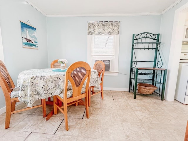 dining space featuring ornamental molding, cooling unit, and baseboards