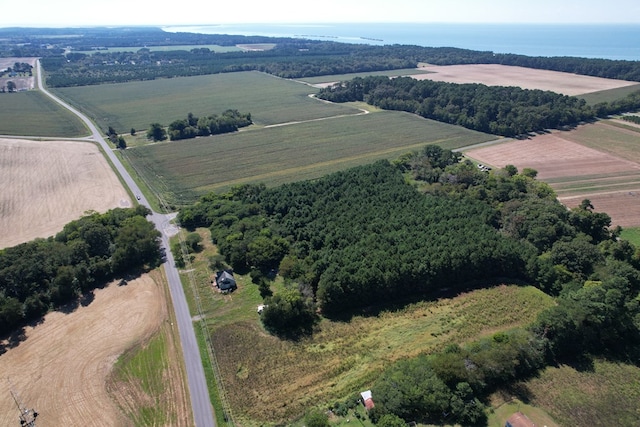 birds eye view of property with a rural view