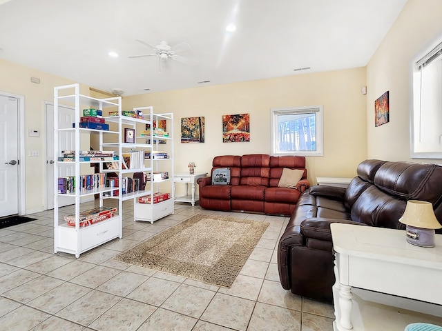 tiled living area featuring a ceiling fan and recessed lighting