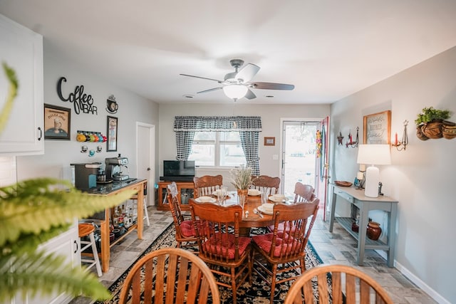 8045 Hickman Farm Ln, Wallops Island, VA 23337 - dining area featuring baseboards and a ceiling fan