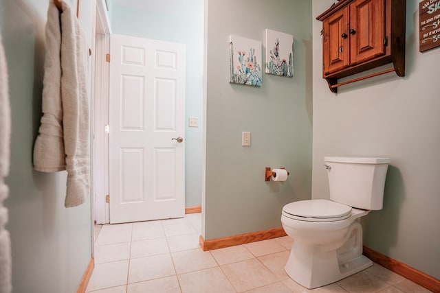 8045 Hickman Farm Ln, Wallops Island, VA 23337 - bathroom featuring toilet, baseboards, and tile patterned floors
