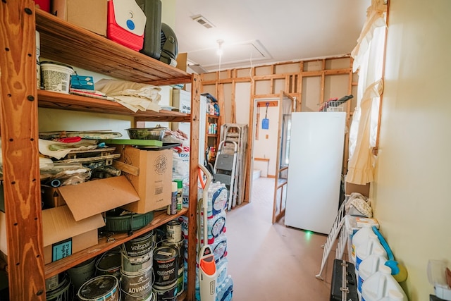 8045 Hickman Farm Ln, Wallops Island, VA 23337 - storage room featuring attic access and visible vents