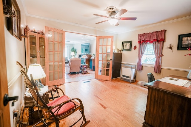 8045 Hickman Farm Ln, Wallops Island, VA 23337 - home office featuring a ceiling fan, ornamental molding, french doors, and wood finished floors