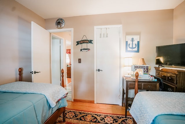 8045 Hickman Farm Ln, Wallops Island, VA 23337 - bedroom featuring wood finished floors