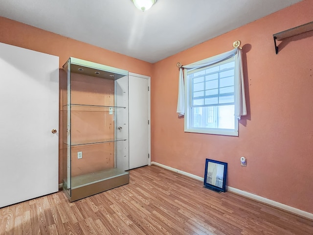 unfurnished bedroom featuring light hardwood / wood-style floors