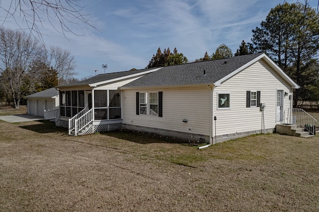 back of house with crawl space, a sunroom, roof with shingles, and a yard