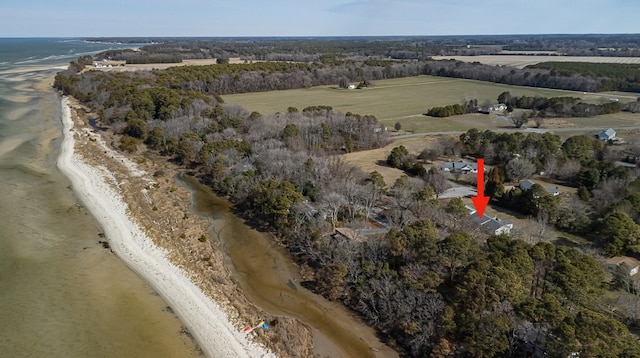 aerial view with a water view and a view of the beach