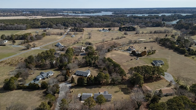 drone / aerial view featuring a rural view and a water view