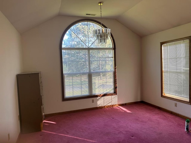 9370 Southwind Rd, Atlantic, VA 23303 - spare room featuring vaulted ceiling, carpet flooring, plenty of natural light, and baseboards