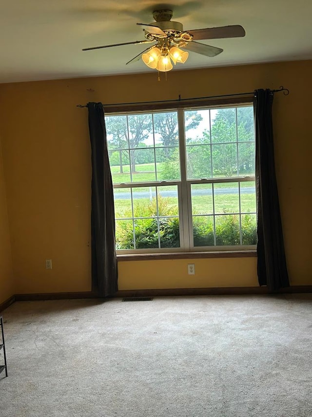 9370 Southwind Rd, Atlantic, VA 23303 - carpeted empty room with a ceiling fan and baseboards
