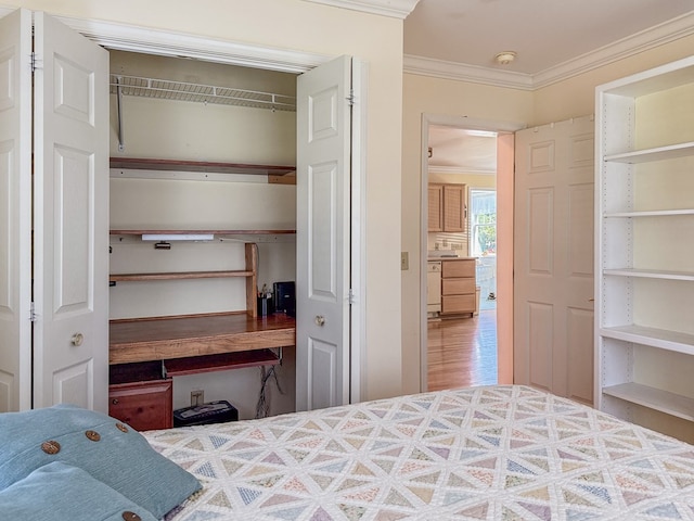 21382 Southside Rd, Onancock, VA 23417 - bedroom with crown molding, a closet, and wood finished floors