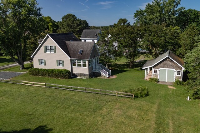 21382 Southside Rd, Onancock, VA 23417 - view of home's exterior featuring an outdoor structure and a garage