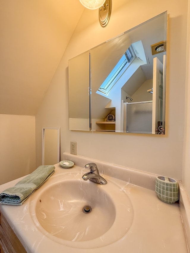 21382 Southside Rd, Onancock, VA 23417 - bathroom featuring vaulted ceiling, vanity, and an enclosed shower