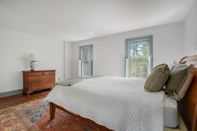 bedroom featuring dark hardwood / wood-style floors