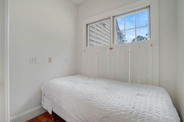 bedroom featuring hardwood / wood-style flooring