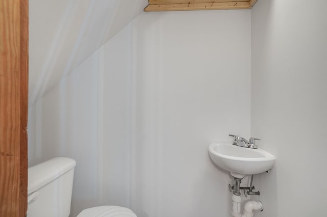 bathroom with sink and toilet