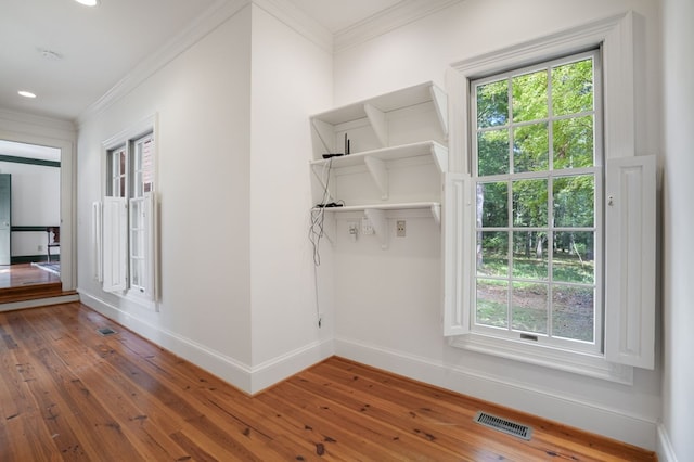 mudroom with hardwood / wood-style flooring and ornamental molding