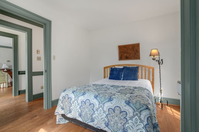 bedroom featuring hardwood / wood-style floors