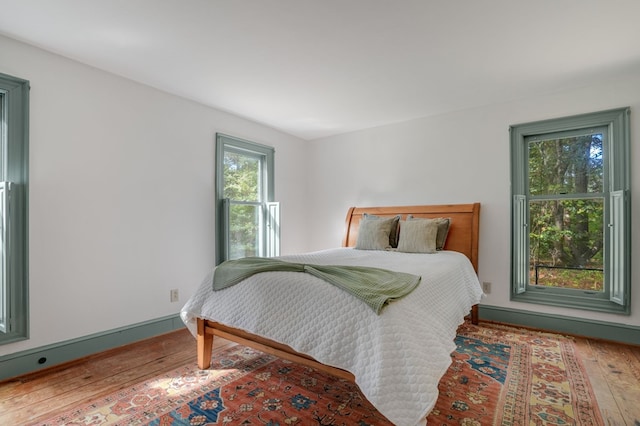 bedroom featuring hardwood / wood-style flooring