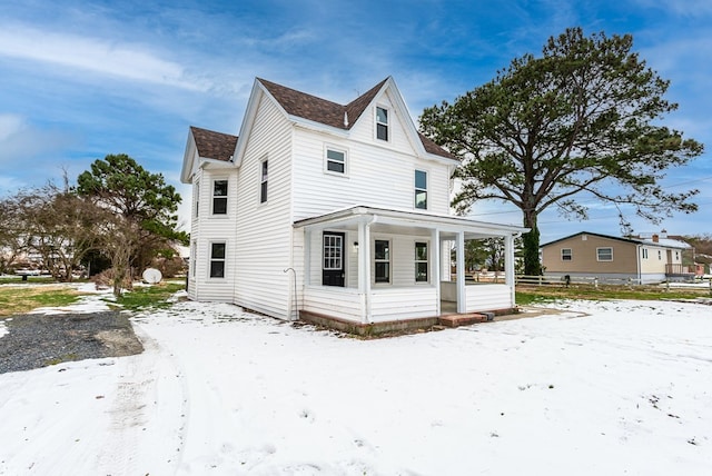 view of front of home featuring covered porch