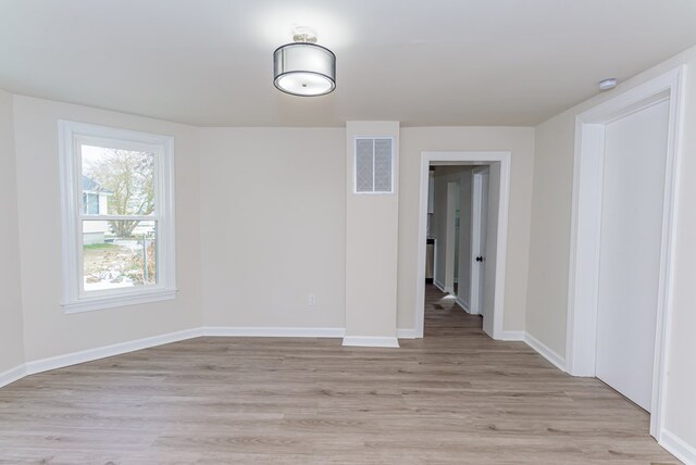 empty room featuring light hardwood / wood-style flooring