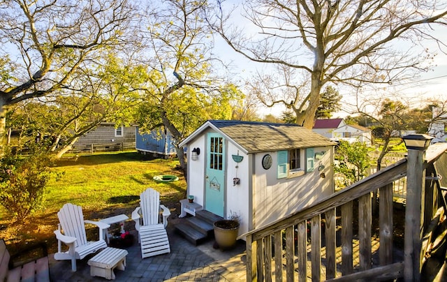 view of outbuilding featuring a yard