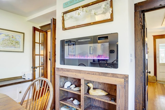 interior details featuring hardwood / wood-style floors