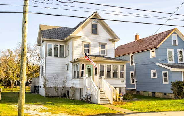 view of front facade with a front lawn