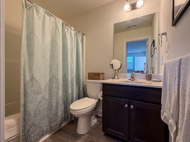 614 Strawberry St, Cape Charles, VA 23310 - full bathroom with vanity, a shower with shower curtain, and tile patterned floors