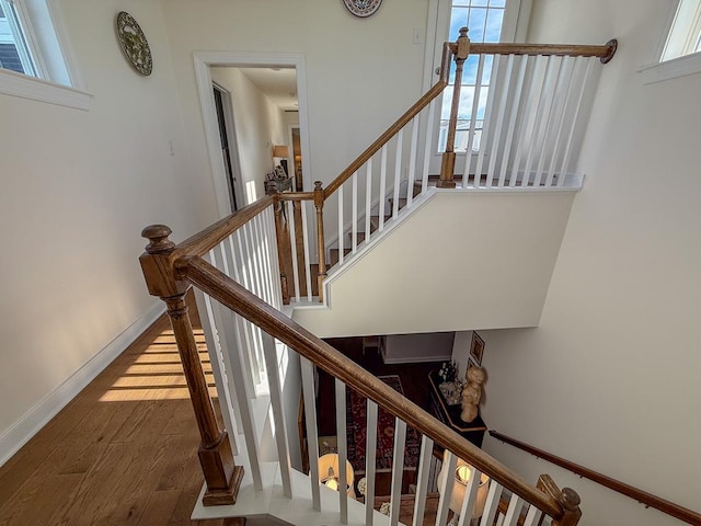 614 Strawberry St, Cape Charles, VA 23310 - stairway with wood finished floors and baseboards