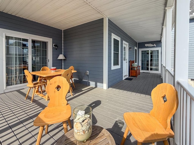 614 Strawberry St, Cape Charles, VA 23310 - wooden terrace with outdoor dining space