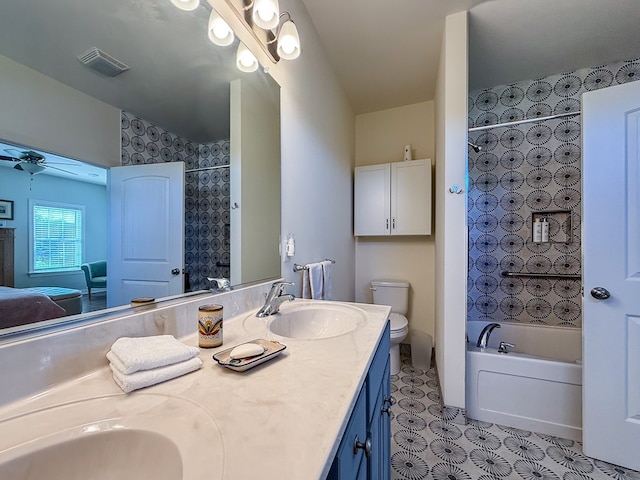 614 Strawberry St, Cape Charles, VA 23310 - full bathroom with double vanity, washtub / shower combination, and ceiling fan