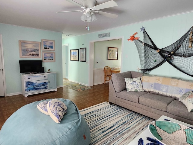 living room with dark parquet floors and ceiling fan