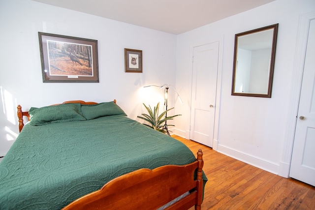 11510 Poplar Ave, Exmore, VA 23350 - bedroom featuring light wood-type flooring and baseboards