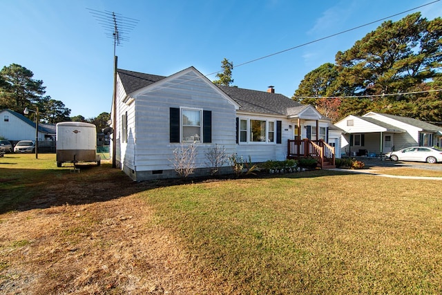 11510 Poplar Ave, Exmore, VA 23350 - bungalow-style home featuring crawl space, a front yard, a shingled roof, and a chimney