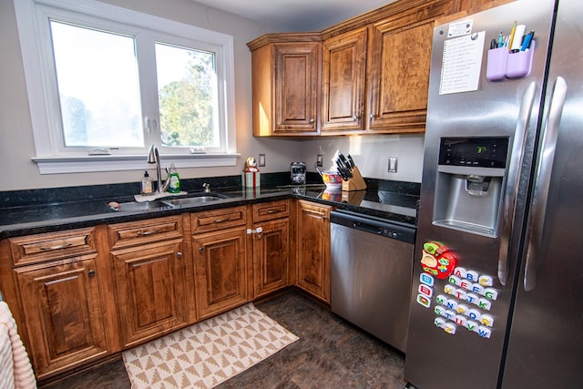 11510 Poplar Ave, Exmore, VA 23350 - kitchen featuring appliances with stainless steel finishes, brown cabinets, and dark stone countertops