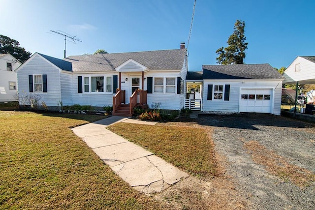 11510 Poplar Ave, Exmore, VA 23350 - view of front of property with a garage, a front lawn, and gravel driveway